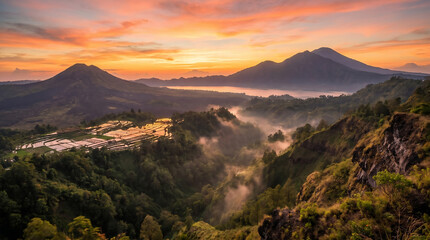 Obraz premium Golden Sunrise Over Mountain Valley With Mist and Dramatic Natural Landscape