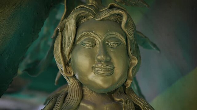 Ancient Southeast Asian religious artifacts: Detail of traditional Buddhist and Hindu carvings.