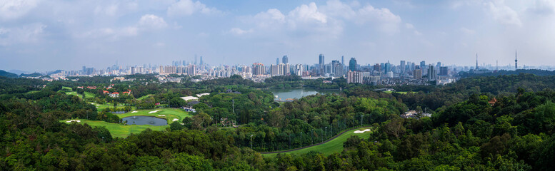 Guangzhou Skyline Above Lush Park and Golf Course © NgoLanThu