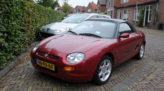 Nijkerk, Netherlands - Oct 14 2024 A parked red MG from 1997. It's a MGF