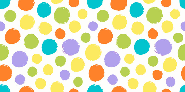 Colorful confetti dot pattern on a white background
