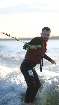 A young man learning Surfing