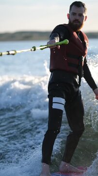 Young man learning Surfing
