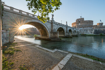 Naklejka premium Ponte Sant'Angelo and Castel Sant'Angelo at sunset, Rome, Italy
