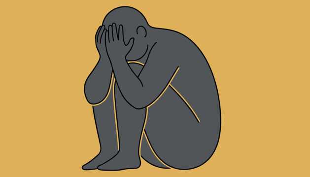 Depressed individual sitting in a fetal position with their head in hands illustrates loneliness, anxiety, and mental breakdown.
