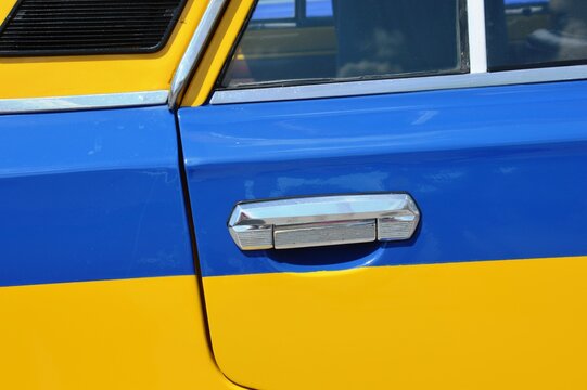 Classic soviet police militsiya sedan car lada vaz 2101 yellow blue with siren