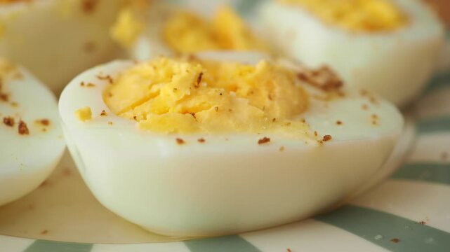 Deviled eggs preparation at a kitchen table