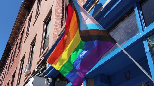 Pride flag flaps in Brooklyn breeze