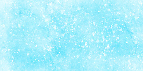 Fototapeta premium Abstract blue grunge background with bokeh effect snowflakes texture. Soft sky-blue paint aquarelle hand-painted watercolor background design. beautiful bright blue paper texture. 