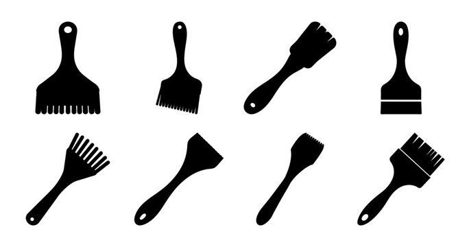 Black painting tools set with brushes and scrapers - A minimalist set of black painting tools including brushes, rollers, and scrapers for artistic or craft projects.