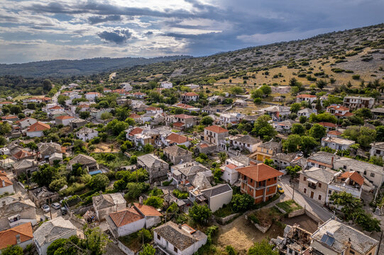 Mountain village in greece with traditional architecture, aerial view over houses