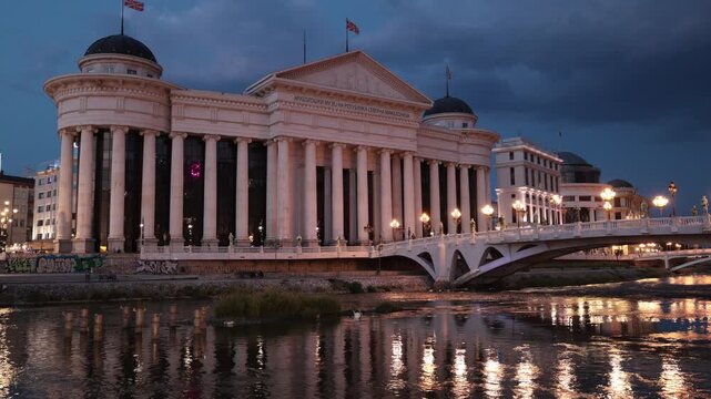Skopje, North Macedonia - August 06, 2025: Evening view of the archaeological museum of the Republic of Macedonia in the city center of Skopje. North Macedonia 