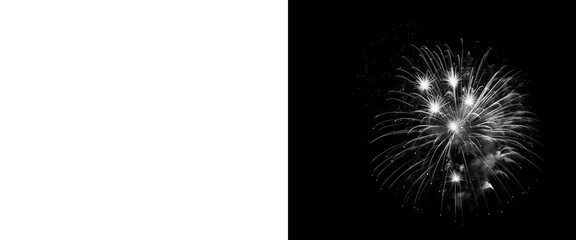 Fototapeta premium Monochrome fireworks explosion on black background, white pyrotechnic burst with light trails, festive celebration display in black and white