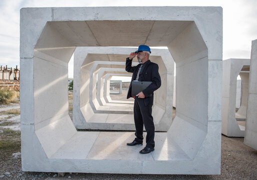 Industrial inspector checks the quality of the concrete structures and frames used for the construction of bridges and aqueducts. Full length..