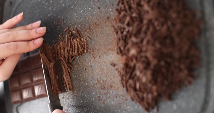 crushed dark chocolate chips, making dessert
