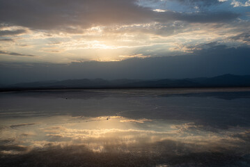 Fototapeta premium Spectacular sunset reflection on the Danakil salt flat