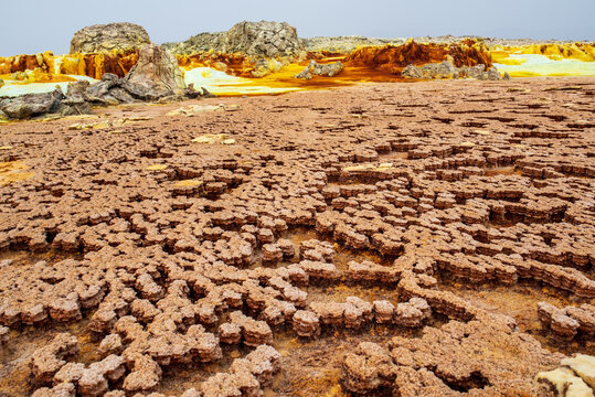 Rugged salt terraces and sulfur deposits in Dallol