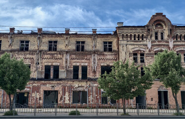 Fototapeta premium destroyed and burned houses in the city Ukraine war