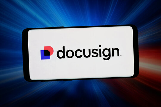 Stuttgart, Germany - 06-10-2026: In this photo illustration, the logo of US software company Docusign Inc. is displayed on a smartphone in front of abstract background on computer screen.