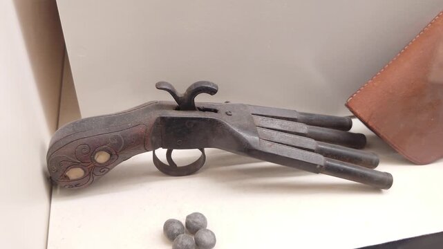Single Antique Flintlock Pistol on Display