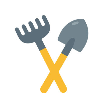 Garden tools consisting of a rake and spade crossed on a white background