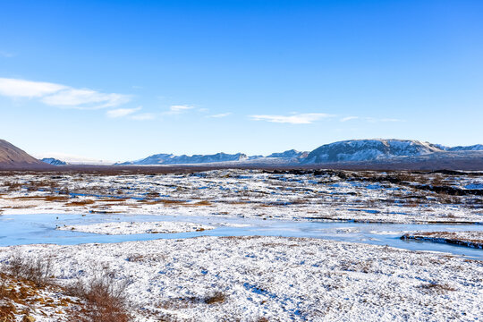 Beautiful and blue Icelandic winter landscape near Reykjav&iacute;k at Thingvellir National Park, Iceland.
