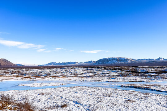Beautiful and blue Icelandic winter landscape near Reykjav&iacute;k at Thingvellir National Park, Iceland.
