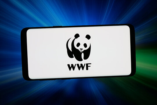 Stuttgart, Germany - 06-10-2026: In this photo illustration, the logo of organisation World Wildlife Fund (WWF) is displayed on a smartphone in front of abstract background on computer screen.