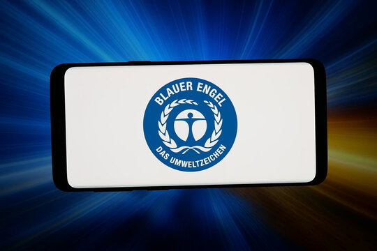 Stuttgart, Germany - 06-10-2026: In this photo illustration, the logo of German environmental label Blauer Engel is displayed on a smartphone in front of abstract background on computer screen.