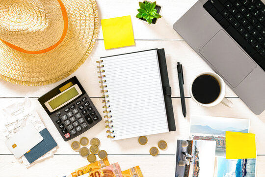 Travel vacation financial planning desk flat lay