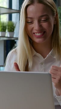 Happy smiling friendly Caucasian businesswoman talking video call greeting hello showing thumb up business woman female girl talk conference laptop virtual chat smile communicate speak at office table