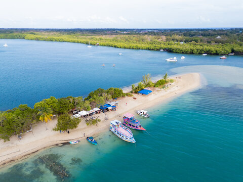Aerial View of Sandy Spit with Boats and Palm Trees Tobago