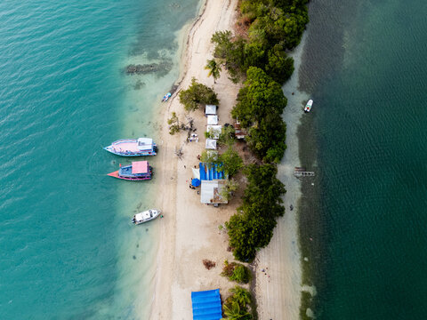 Aerial View of Beach with Boats and Palm Trees Tobago