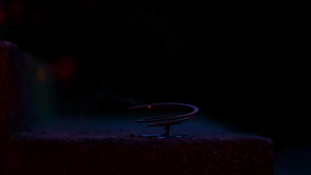 Mosquito repellent coil slowly burning at night
