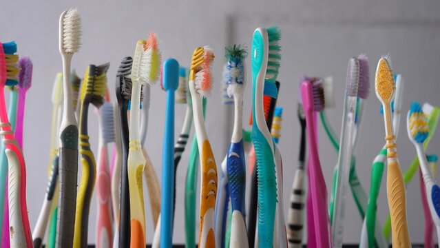 Plastic Toothbrushes. Plastic Waste and Toothbrush Recycling Concept for Environmental Awareness