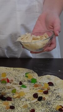 step by step recipe Christmas Easter bread Panettone krafin preparing soft layered Easter cruffin dough dried fruits, orange zest, poppy seeds and butter during homemade sweet bread baking process