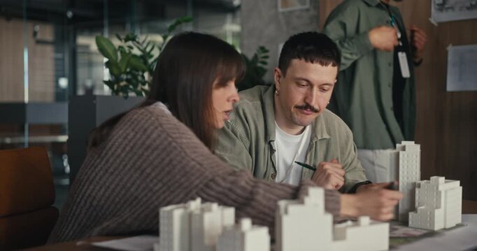 Architects reviewing an urban design project at a table