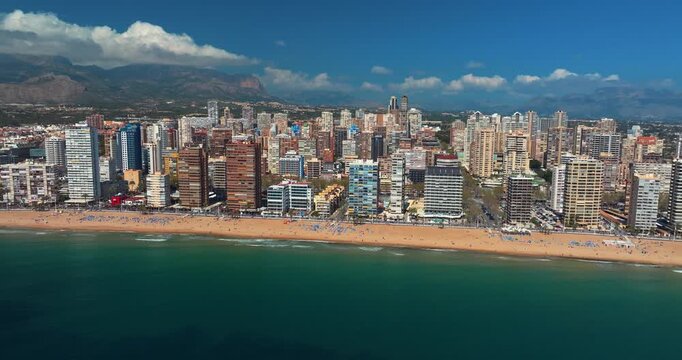 Benidorm aerial panorama Costa Blanca Spain highrise beach skyline drone view Mediterranean sea mountains summer tourism cityscape travel destination resort