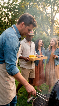 Inclusive friends sharing food at welcoming July Fourth cookout