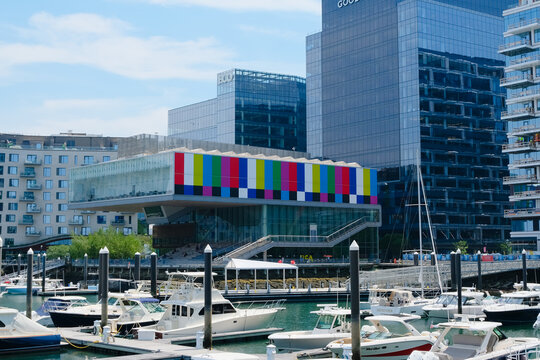 Boston, USA - 10 June 2026. The Institute of Contemporary Art (ICA) in Boston features a vibrant, technicolor exterior with boats in front of museum building.