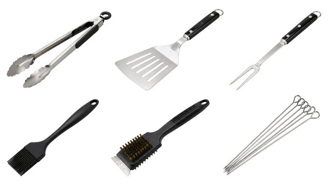 Stainless steel barbecue tool set with tongs, slotted spatula, fork, silicone basting brush, grill brush with scraper and multiple metal skewers on transparent background