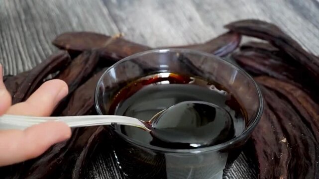 along with carob syrup and dry carobs, carob syrup for human health.