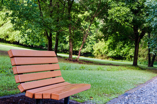 Recycled Plastic Lumber Park Bench Along Wooded Trail at Fowler Park in Cumming, Georgia