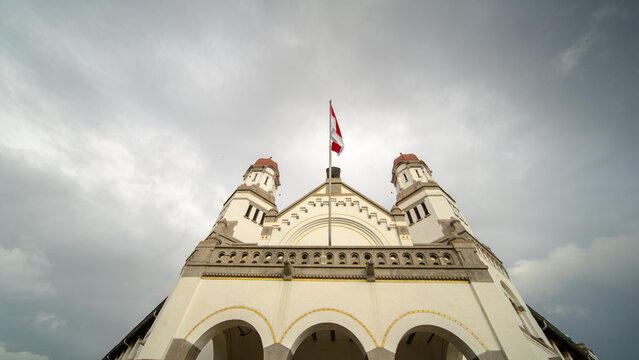 Historic Lawang Sewu Colonial Building with Indonesian Flag in Semarang