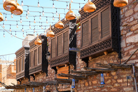 Traditional hejazi stone building with wooden roshan balconies in Al Balad of Taif, Saudi Arabia