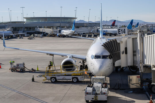 Las Vegas, NV, USA - Oct 30, 2024: A Boeing 737-900ER aircraft operated by Alaska Airlines is seen parked at a terminal gate in Harry Reid International Airport in Las Vegas, Nevada.