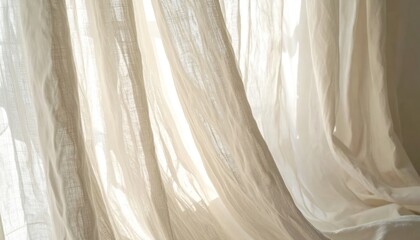 Obraz premium Sunlight streams through sheer, cream-colored fabric, creating ethereal shadows