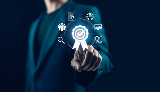 Businessman selecting quality assurance certification on virtual interface. Compliance management, performance improvement, process optimization, audit control and business excellence concept.