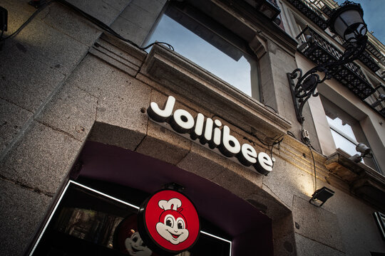 MADRID, SPAIN - FEBRUARY 22, 2026: Jollibee logo on a fast food storefront in Madrid, spain Jollibee is a filipino chain of fast food restaurants.