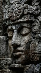Obraz premium Maya Aztec civilization, Mexico culture. Mysterious, fantasy. A closeup of a stone carving of a human face, intricately carved with detailed facial features.